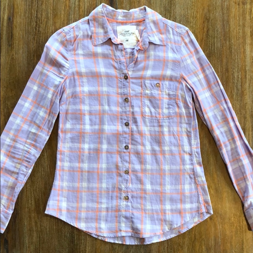 Plaid button up shirt.
